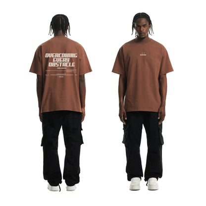 Brown ‘Overcoming Every Obstacle’ T-shirt (Unisex)